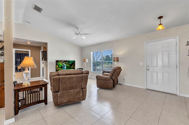 6344 Hera St, Englewood, FL 34224 - living room featuring vaulted ceiling, a ceiling fan, light tile patterned floors, baseboards, and visible vents