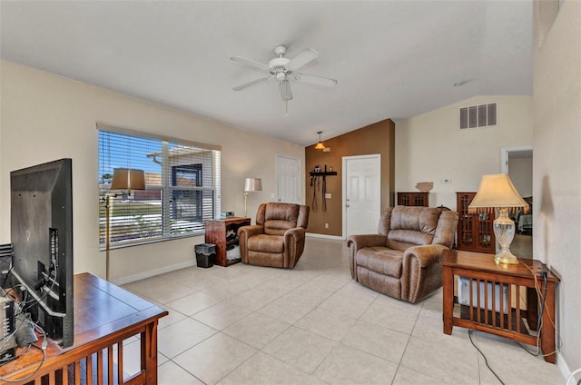 6344 Hera St, Englewood, FL 34224 - living area featuring vaulted ceiling, visible vents, a ceiling fan, light tile patterned flooring, and baseboards