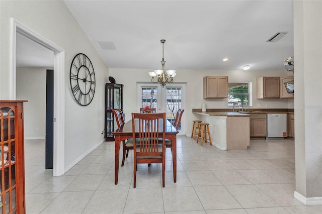 6344 Hera St, Englewood, FL 34224 - dining space with light tile patterned floors, an inviting chandelier, baseboards, visible vents, and recessed lighting