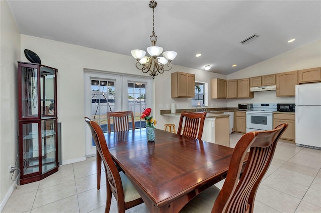 6344 Hera St, Englewood, FL 34224 - dining area featuring lofted ceiling, visible vents, light tile patterned flooring, baseboards, and a chandelier