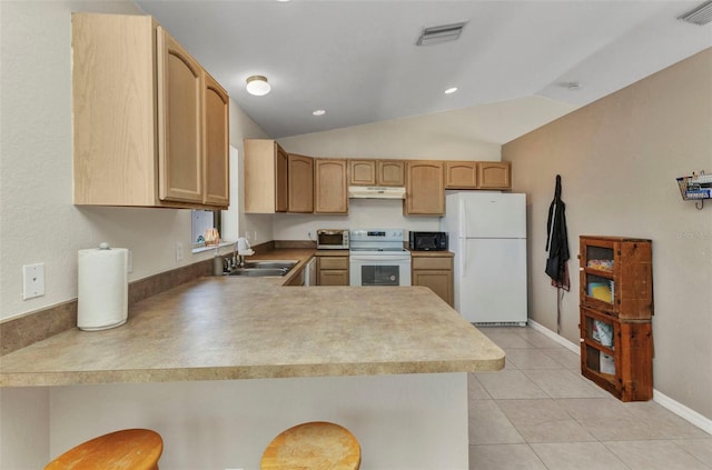 6344 Hera St, Englewood, FL 34224 - kitchen featuring under cabinet range hood, visible vents, a sink, white appliances, and a peninsula