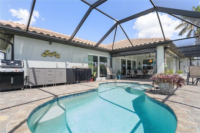 pool featuring glass enclosure, a grill, a patio, outdoor dining space, and ceiling fan