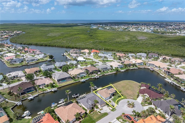 aerial view featuring a residential view and a water view