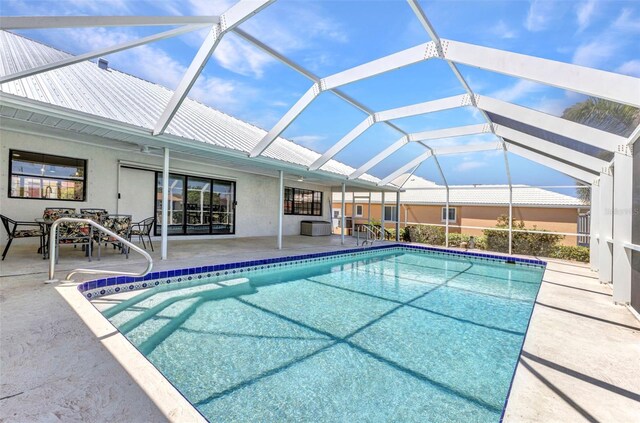2718 Saint Thomas Dr, Punta Gorda, FL 33950 - outdoor pool featuring a patio area and glass enclosure