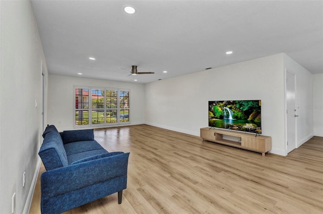 2718 Saint Thomas Dr, Punta Gorda, FL 33950 - living area featuring light wood finished floors, a ceiling fan, baseboards, and recessed lighting