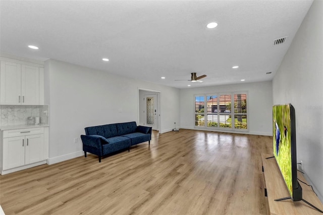 2718 Saint Thomas Dr, Punta Gorda, FL 33950 - sitting room with recessed lighting, visible vents, a ceiling fan, light wood-style floors, and baseboards