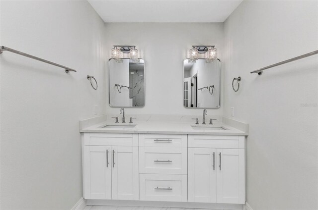 2718 Saint Thomas Dr, Punta Gorda, FL 33950 - bathroom with baseboards, a sink, and double vanity