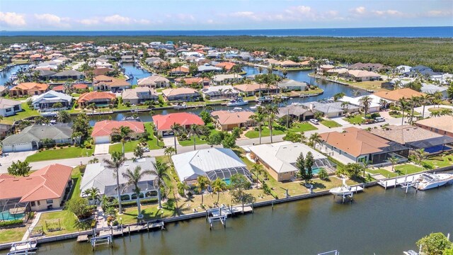 2718 Saint Thomas Dr, Punta Gorda, FL 33950 - drone / aerial view with a water view and a residential view