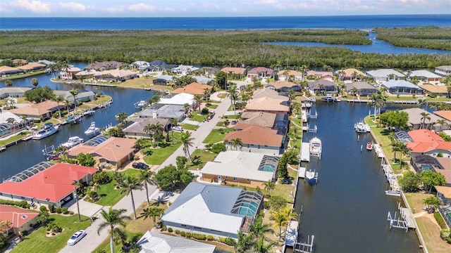 2718 Saint Thomas Dr, Punta Gorda, FL 33950 - birds eye view of property featuring a water view and a residential view