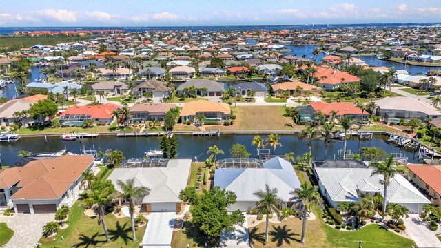 2718 Saint Thomas Dr, Punta Gorda, FL 33950 - drone / aerial view with a residential view and a water view