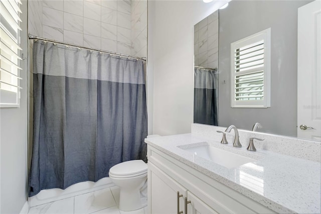 bathroom with a shower with curtain, toilet, and vanity