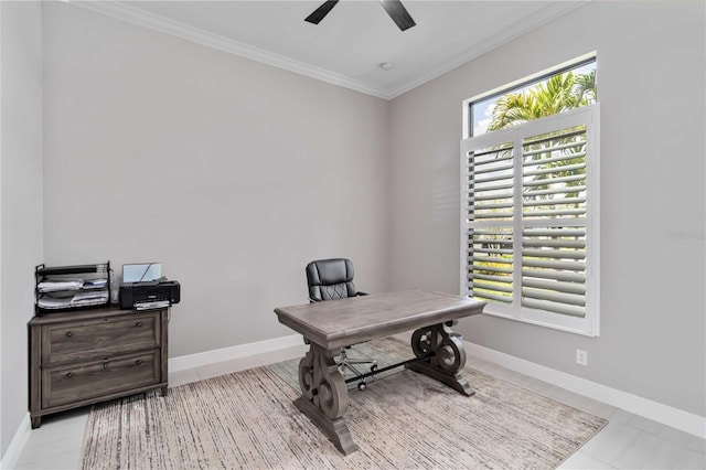 home office with a ceiling fan, ornamental molding, baseboards, and light tile patterned floors