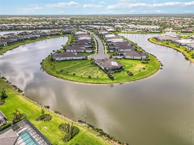 bird's eye view featuring a residential view and a water view