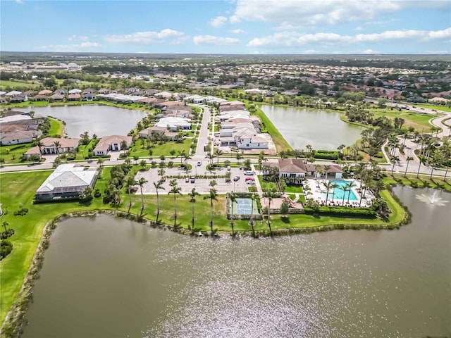 aerial view featuring a residential view and a water view