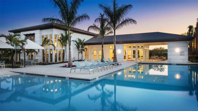 community pool featuring a patio area and french doors