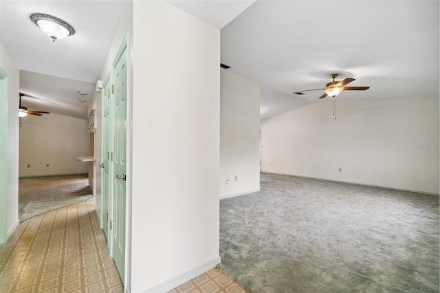 2192 Hyatt Dr, Port Charlotte, FL 33948 - hallway with carpet floors, baseboards, and lofted ceiling