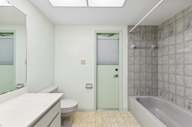 2192 Hyatt Dr, Port Charlotte, FL 33948 - bathroom with baseboards, toilet, vanity, shower / tub combination, and tile patterned flooring