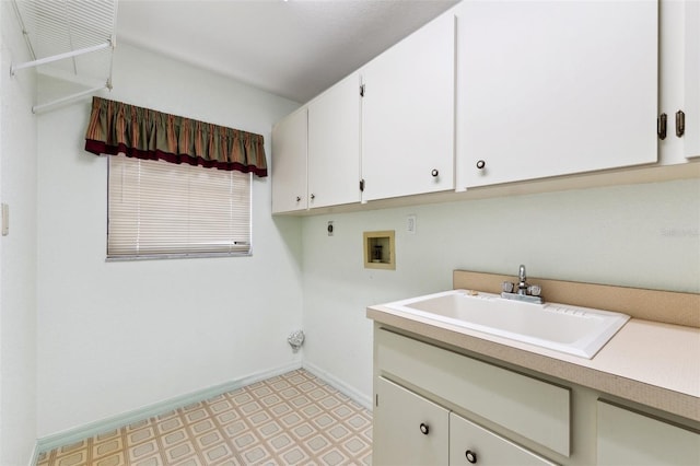 2192 Hyatt Dr, Port Charlotte, FL 33948 - washroom featuring a sink, cabinet space, light floors, and washer hookup