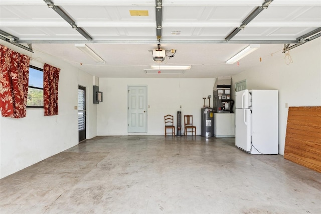 2192 Hyatt Dr, Port Charlotte, FL 33948 - garage featuring a garage door opener, freestanding refrigerator, heating unit, and water heater