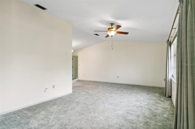 2192 Hyatt Dr, Port Charlotte, FL 33948 - spare room with carpet floors, ceiling fan, visible vents, and lofted ceiling