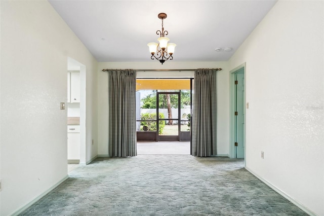 2192 Hyatt Dr, Port Charlotte, FL 33948 - carpeted empty room with baseboards and a chandelier