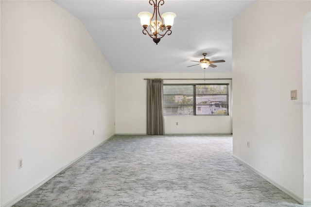 2192 Hyatt Dr, Port Charlotte, FL 33948 - carpeted spare room featuring ceiling fan with notable chandelier, baseboards, and lofted ceiling