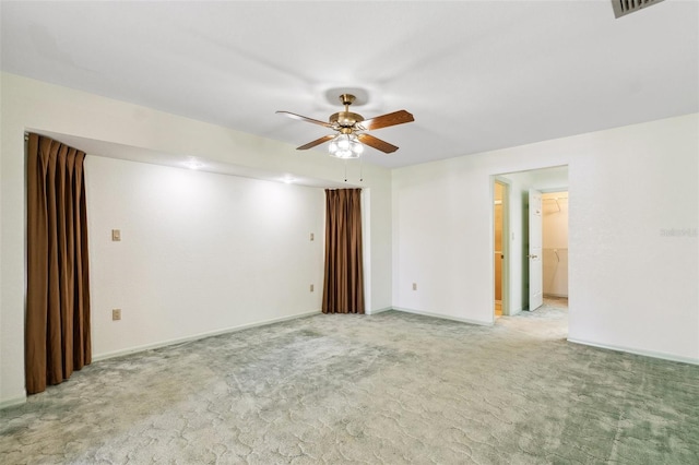 2192 Hyatt Dr, Port Charlotte, FL 33948 - empty room featuring light colored carpet, baseboards, and ceiling fan
