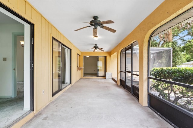 2192 Hyatt Dr, Port Charlotte, FL 33948 - sunroom with plenty of natural light, concrete floors, and ceiling fan
