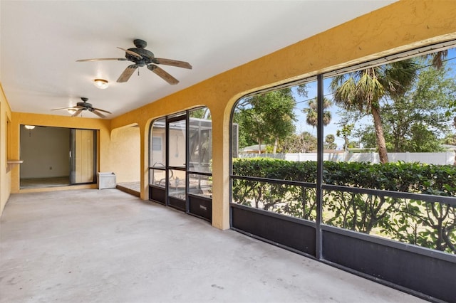 2192 Hyatt Dr, Port Charlotte, FL 33948 - unfurnished sunroom with ceiling fan and plenty of natural light