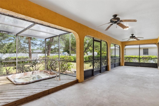 2192 Hyatt Dr, Port Charlotte, FL 33948 - unfurnished sunroom featuring a ceiling fan and a hot tub