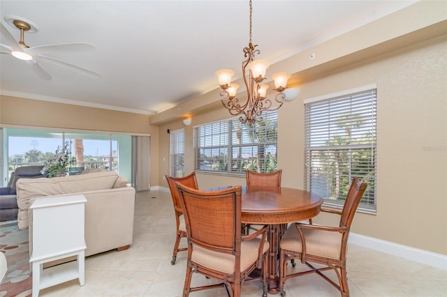 1326 Wesley Dr Unit 123, Punta Gorda, FL 33950 - dining area featuring ornamental molding, baseboards, light tile patterned flooring, and ceiling fan with notable chandelier
