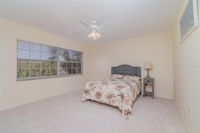 1326 Wesley Dr Unit 123, Punta Gorda, FL 33950 - carpeted bedroom featuring baseboards and ceiling fan