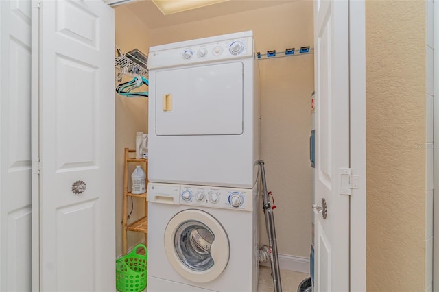 1326 Wesley Dr Unit 123, Punta Gorda, FL 33950 - clothes washing area with laundry area and stacked washer and clothes dryer