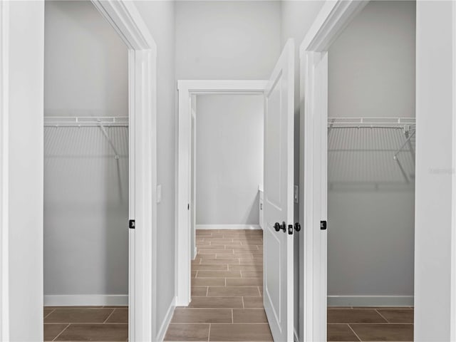4425 Lagoon Ter, North Port, FL 34286 - hall featuring wood finish floors and baseboards