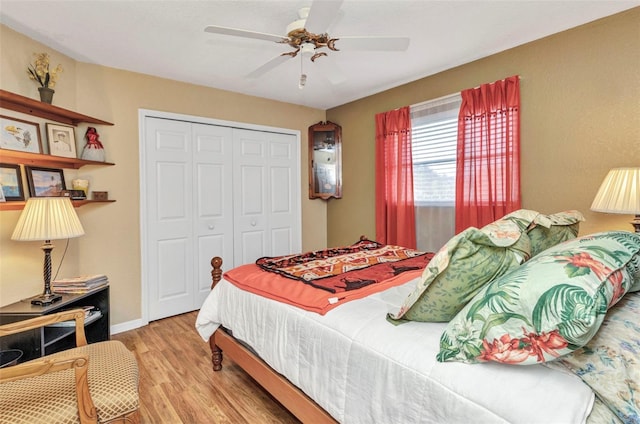 23104 Turnbull Ave, Port Charlotte, FL 33954 - bedroom featuring a closet, wood finished floors, baseboards, and a ceiling fan