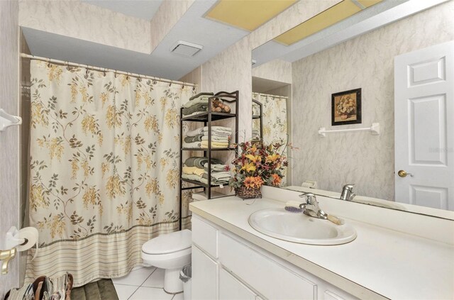 23104 Turnbull Ave, Port Charlotte, FL 33954 - bathroom featuring tile patterned flooring, curtained shower, vanity, and toilet