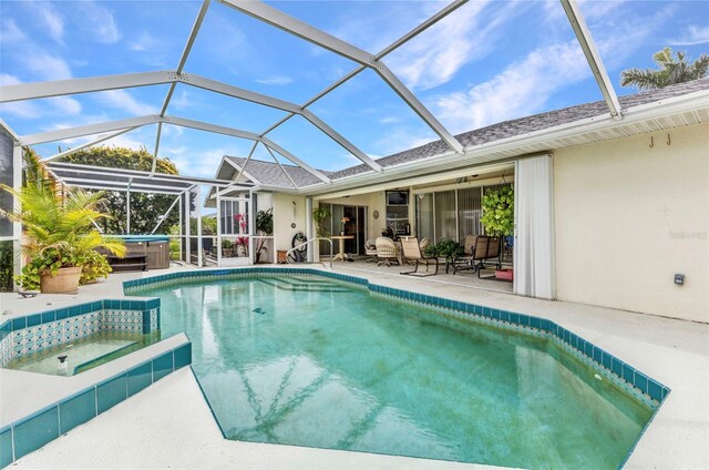 23104 Turnbull Ave, Port Charlotte, FL 33954 - outdoor pool featuring a patio, a lanai, and a hot tub
