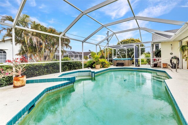 23104 Turnbull Ave, Port Charlotte, FL 33954 - outdoor pool with a patio area, a hot tub, and glass enclosure