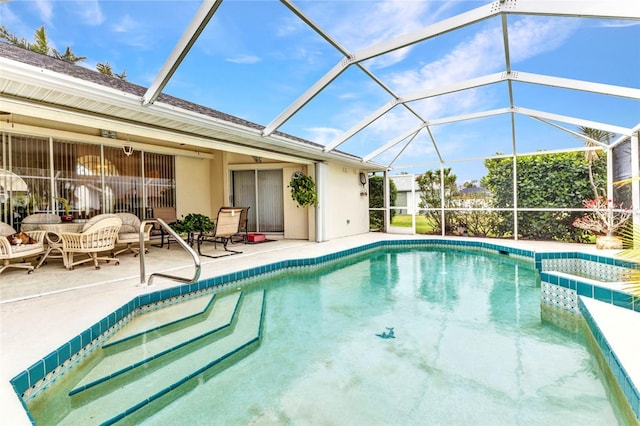 23104 Turnbull Ave, Port Charlotte, FL 33954 - outdoor pool featuring a patio area and glass enclosure