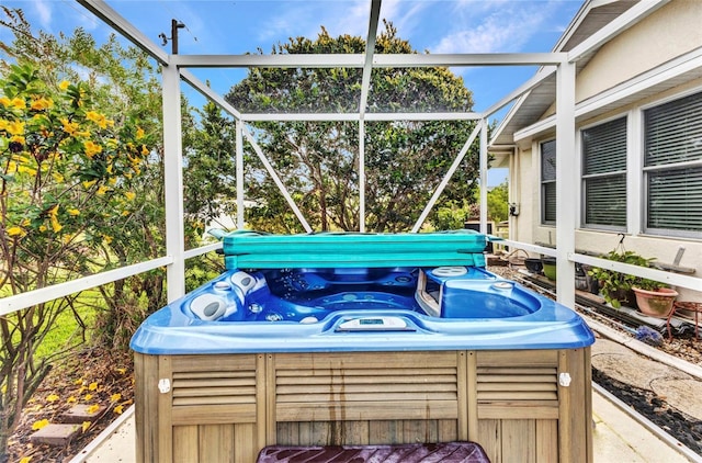 23104 Turnbull Ave, Port Charlotte, FL 33954 - view of patio featuring glass enclosure and a hot tub