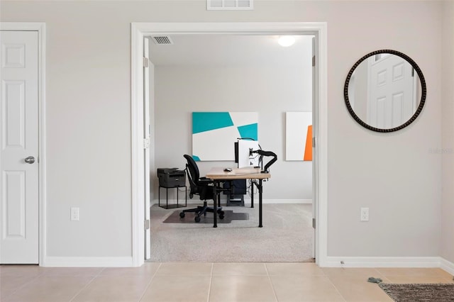 7209 W Lenox Cir, Punta Gorda, FL 33950 - carpeted office space featuring visible vents, baseboards, and tile patterned floors