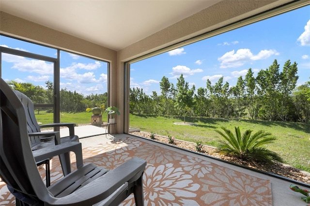 7209 W Lenox Cir, Punta Gorda, FL 33950 - sunroom with a wealth of natural light and carpet floors