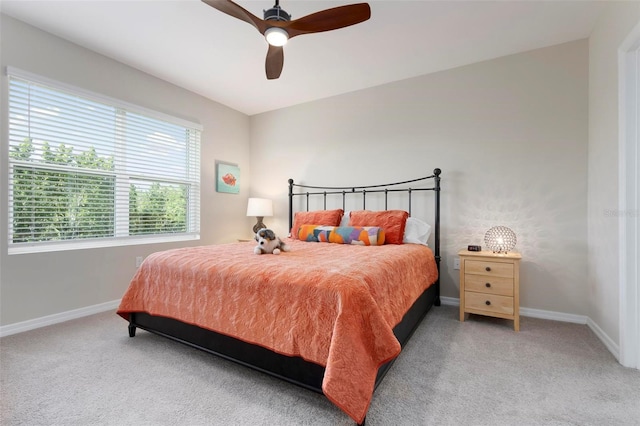 7209 W Lenox Cir, Punta Gorda, FL 33950 - bedroom featuring carpet flooring, baseboards, and a ceiling fan