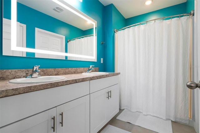 7209 W Lenox Cir, Punta Gorda, FL 33950 - full bathroom with a sink, visible vents, and double vanity