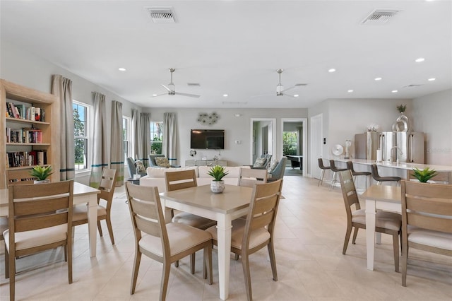 7209 W Lenox Cir, Punta Gorda, FL 33950 - dining area with a healthy amount of sunlight, ceiling fan, and recessed lighting