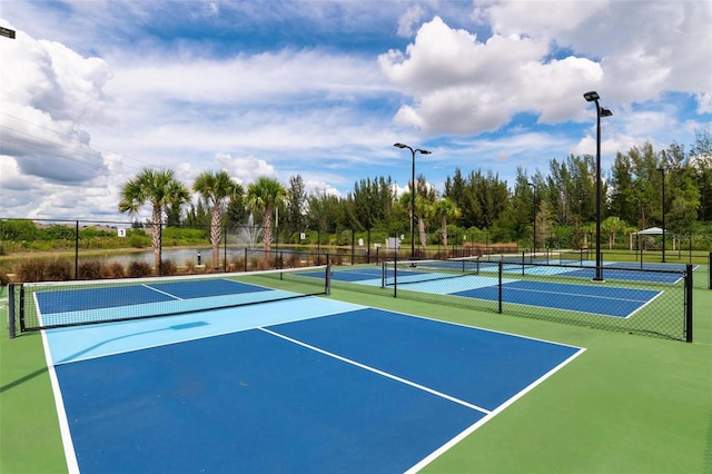 7209 W Lenox Cir, Punta Gorda, FL 33950 - view of tennis court with fence and community basketball court