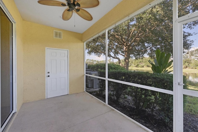 1085 Jonah Dr, North Port, FL 34289 - unfurnished sunroom featuring visible vents and ceiling fan