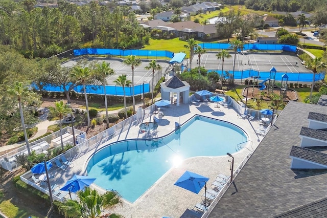 1085 Jonah Dr, North Port, FL 34289 - community pool featuring fence and a patio