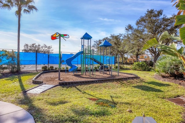 1085 Jonah Dr, North Port, FL 34289 - community jungle gym featuring fence and a yard