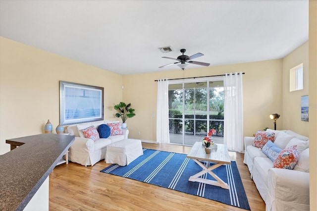 1085 Jonah Dr, North Port, FL 34289 - living room featuring plenty of natural light, wood finished floors, and ceiling fan